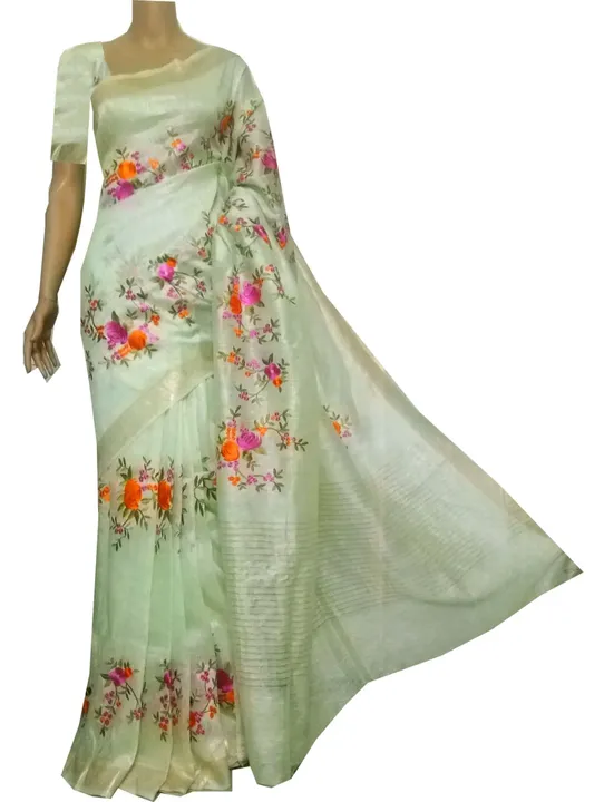 Pale green linen-silk saree with floral embroidery
